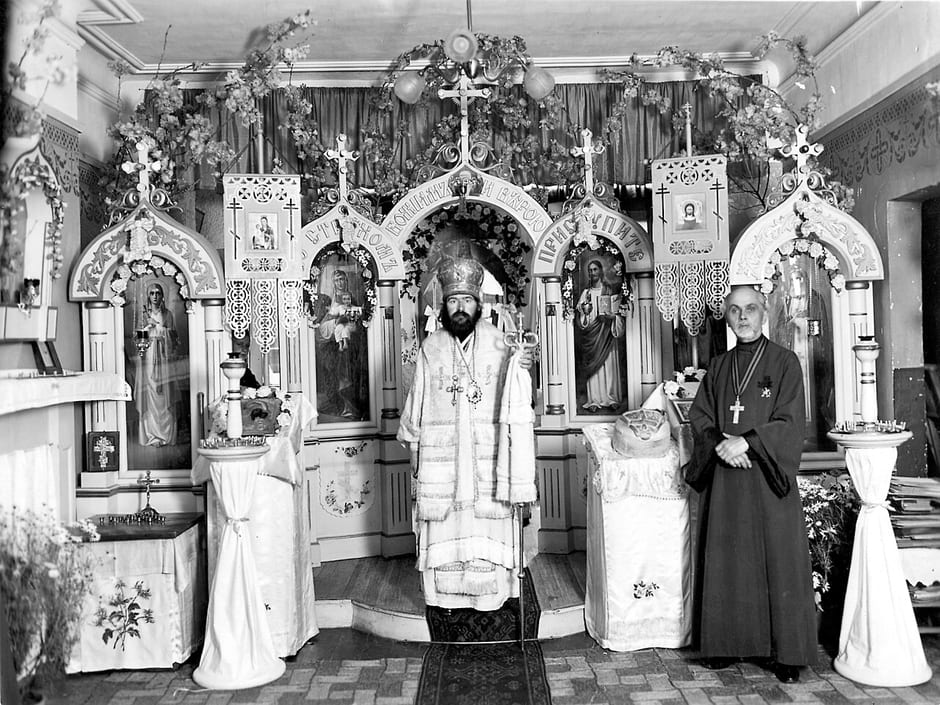 Bishop John vested for the Divine Liturgy before the iconostasis in his Shanghai years