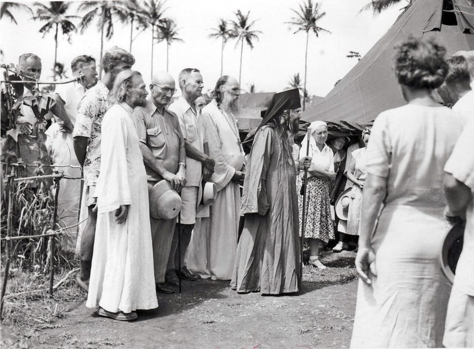 Archbishop John Maximovitch among the Russian refugees at the tent camp on Tubabao Island in the Philippines, 1949